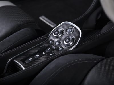 closeup-shot-engine-start-buttons-inside-modern-sport-car_181624-33132